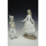 A Lladro figurine and one other, tallest 26 cm