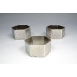 Three Keswick School of Industrial Art Staybright napkin rings