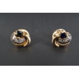 A pair of 9 ct gold, blue and white stone stud earrings, 1 g