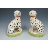 A pair of early 19th Century Staffordshire dalmations
