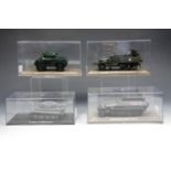 Four cased military vehicles including Humber Armoured Car MKIV