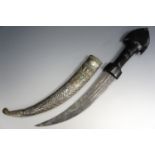 A Middle Eastern khanjar / dagger gifted by Saddam Hussein, having a horn handle and white metal
