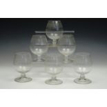 A set of six etched fine glass brandy balloons