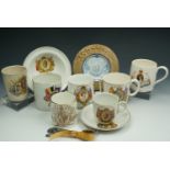 A quantity of royal commemorative mugs, plates and spoons