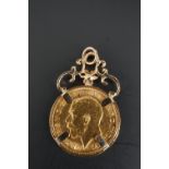 A 1911 half Sovereign in 9 ct gold pendant mount, 5.2 g