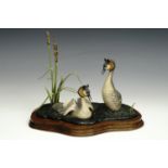 A Border Fine Arts figurine of a pair of Grebe's, 24 cm