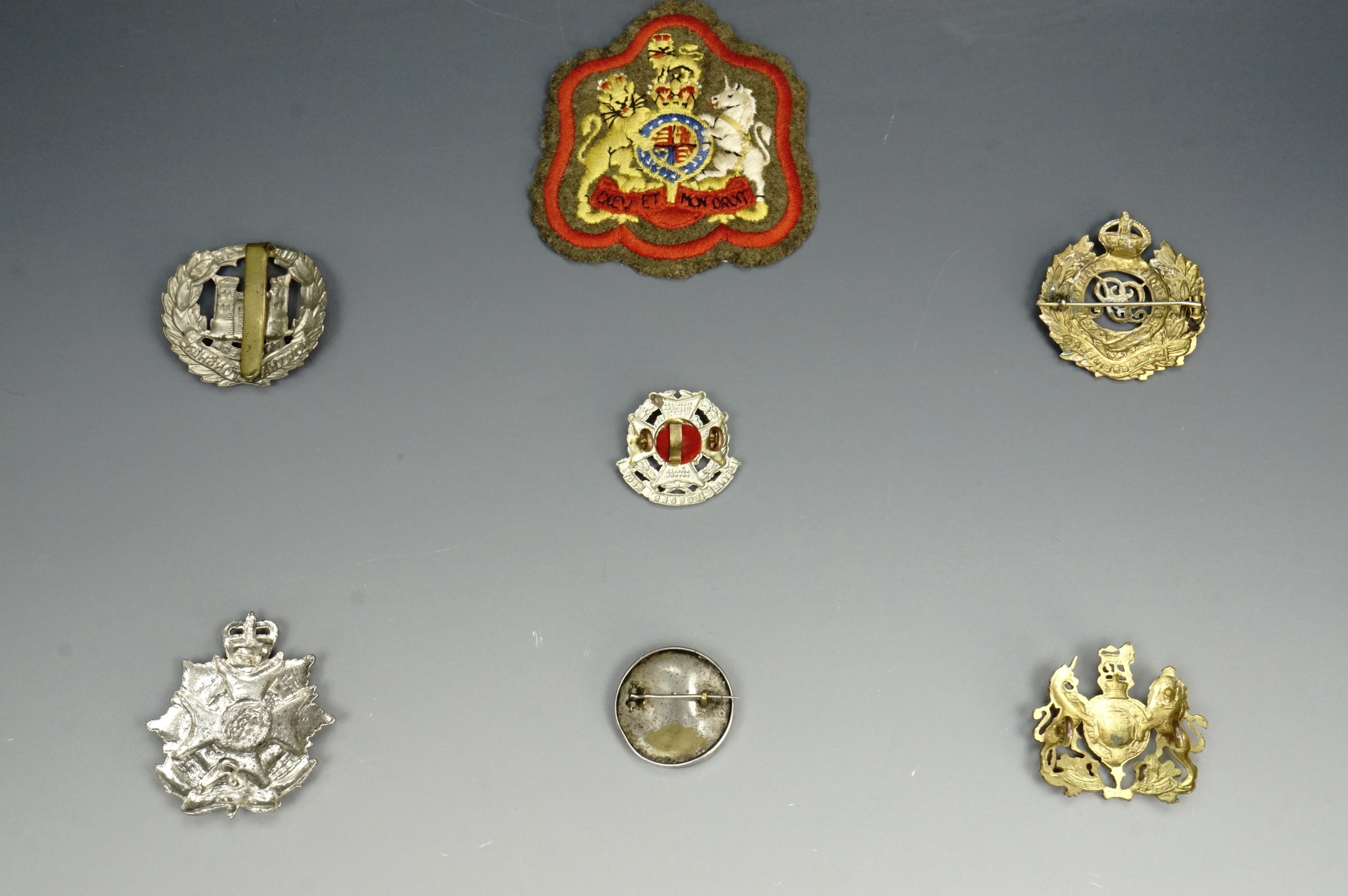 A small group of British army insignia including a Border Regiment cap badge of circa 1953-9 - Image 2 of 2