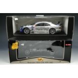 A Mercedes-Benz original-teile AMG CLK 1:18 scale die-cast model together with a similar Maisto
