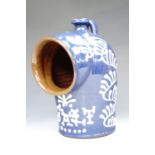 Wetheriggs Pottery, of Penrith, a late 20th century salt pig, slip decorated in blue and white, 22