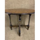 A 1920s diminutive oak gate-leg table, 48 cm x 61 cm x 51 cm