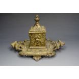 Late 19th Century Viennese gilt brass baroque influenced inkwell with a porcelain liner, 17 cm x