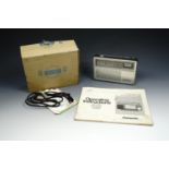 A Grundig 'City-Boy 400' portable radio, AM/FM, in its original box with instructions etc. a/f, 20
