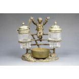 A Victorian novelty electroplate cruet set modeled as a boy leaping from a fence, 14 cm