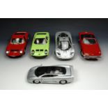 A group of classic luxury convertible die-cast cars