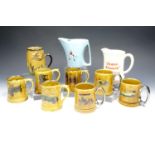 Two Wade whisky water jugs together with seven Wade classic car tankards and a Sylvac tankard