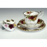 A Royal Albert 'Old Country Roses' cup, saucer and plate together with a matching heart and roses