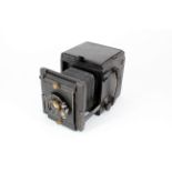 A Houghton or similar quarter-plate reflex SLR camera with Aldis Plano anastigmat lens