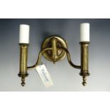 A two branch cast brass wall light by Valson