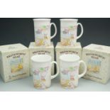 Four Royal Doulton 'Brinkworth Bear' mugs.