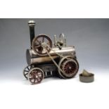 A Carette portable live steam engine with chain drive, 18 x 20 cm