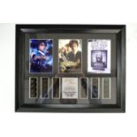 Two Harry Potter framed film stills together with a framed Lord Of The Rings film stills