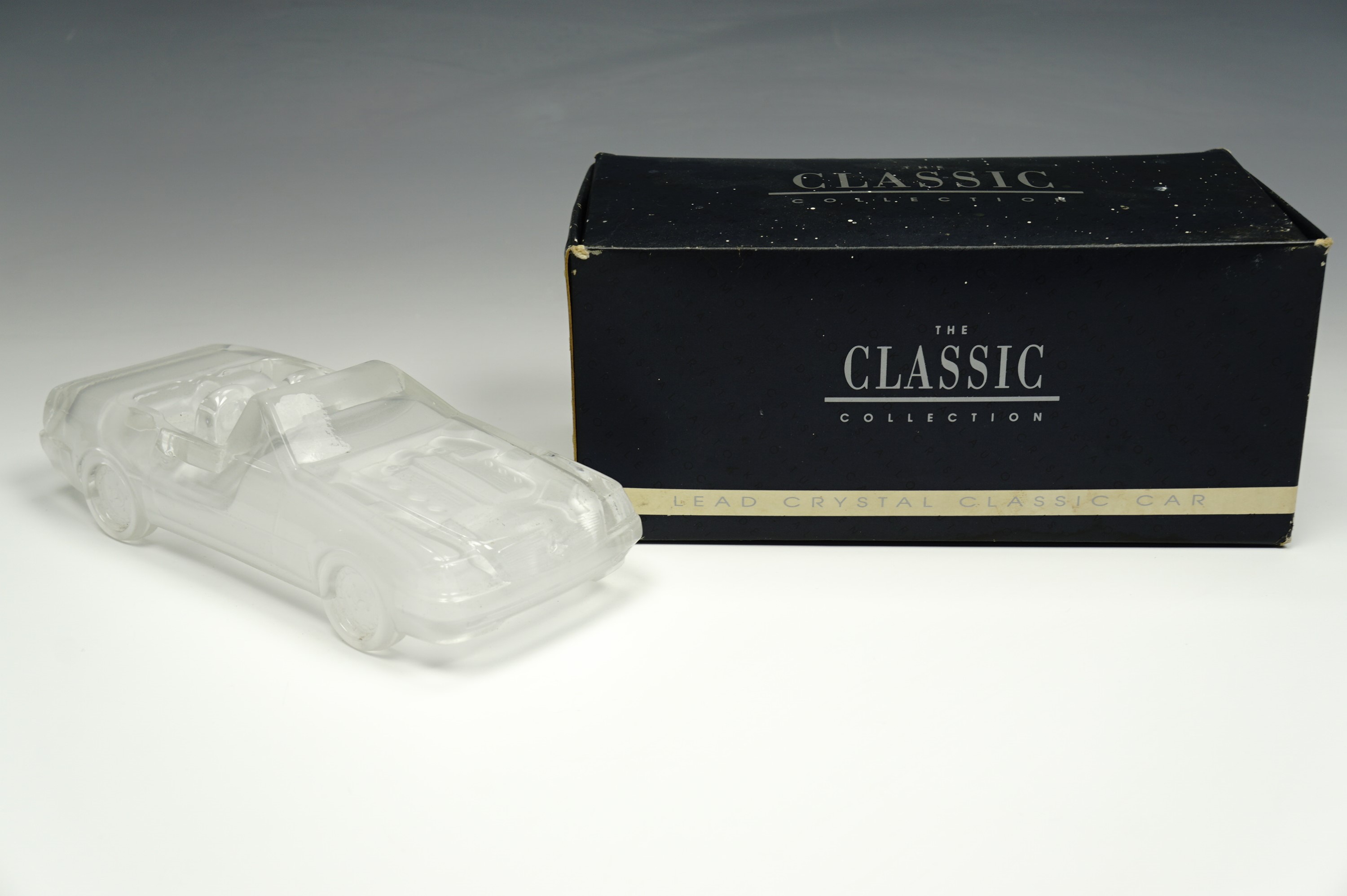 A Crystal Art 'The Classic Collection' lead crystal model of a Mercedes 500SL car