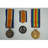 British War and Victory medals to 2774 Pte W H Hyde, KOYLI, together with a silver war badge