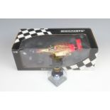 A limited edition Minichamps IMS event Formula One car together with a Onyx miniature of Oliver