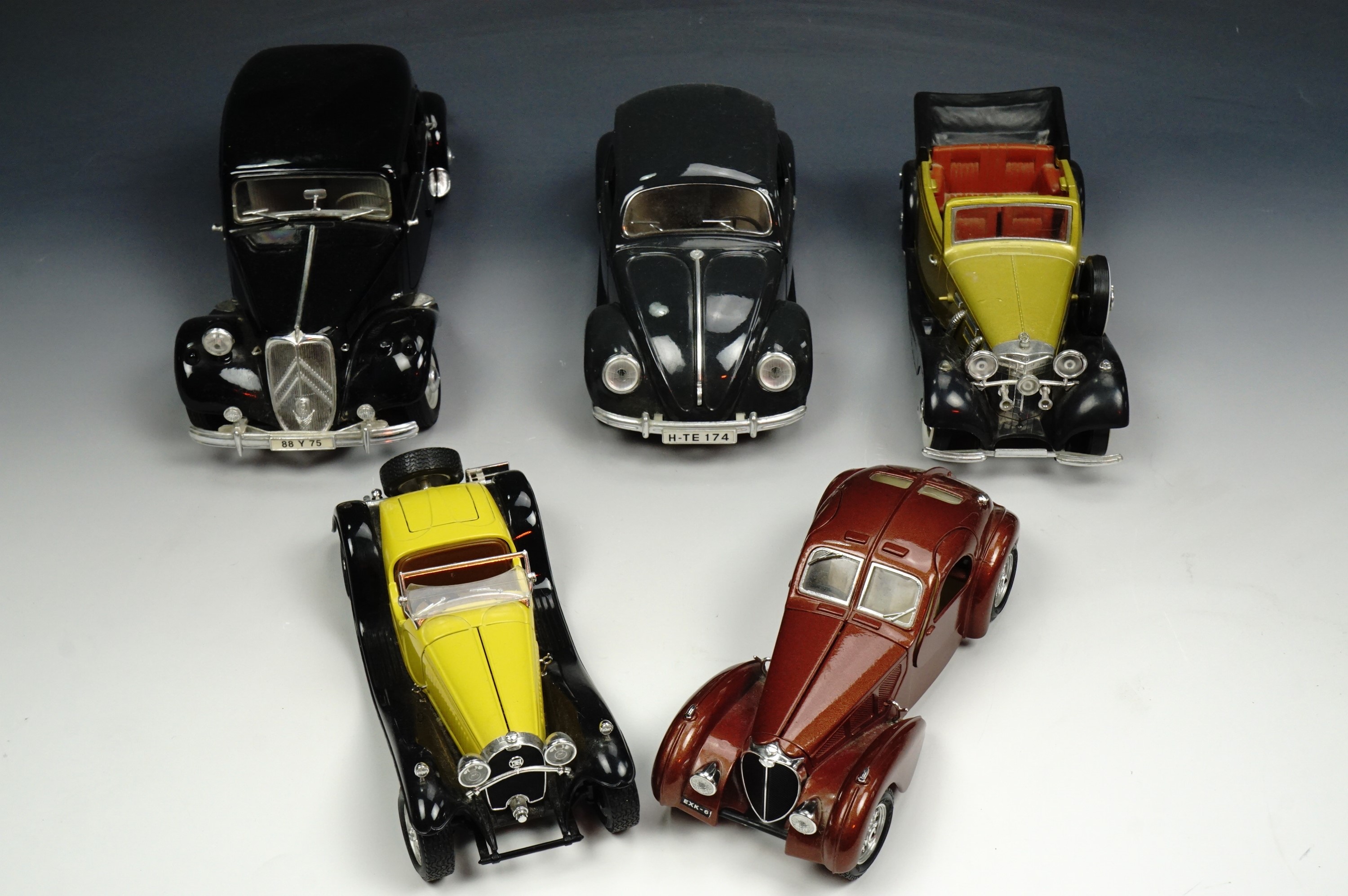 A group of French and other classic die-cast cars