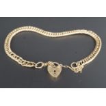 A 9 ct gold close faceted curb link bracelet with padlock clasp, 18 cm, 7.7 g