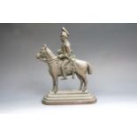 A Victorian cast brass door porter modelled as a heavy cavalry trooper and mount, 27 cm