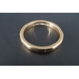 A 9 ct gold band, L, 2.3 g