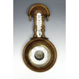 A late Victorian German carved walnut wall barometer, 35 cm