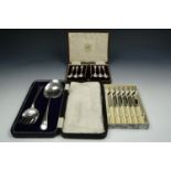 A cased set of electroplate Art Deco inspired teaspoons and sugar tongs together with a cased desert