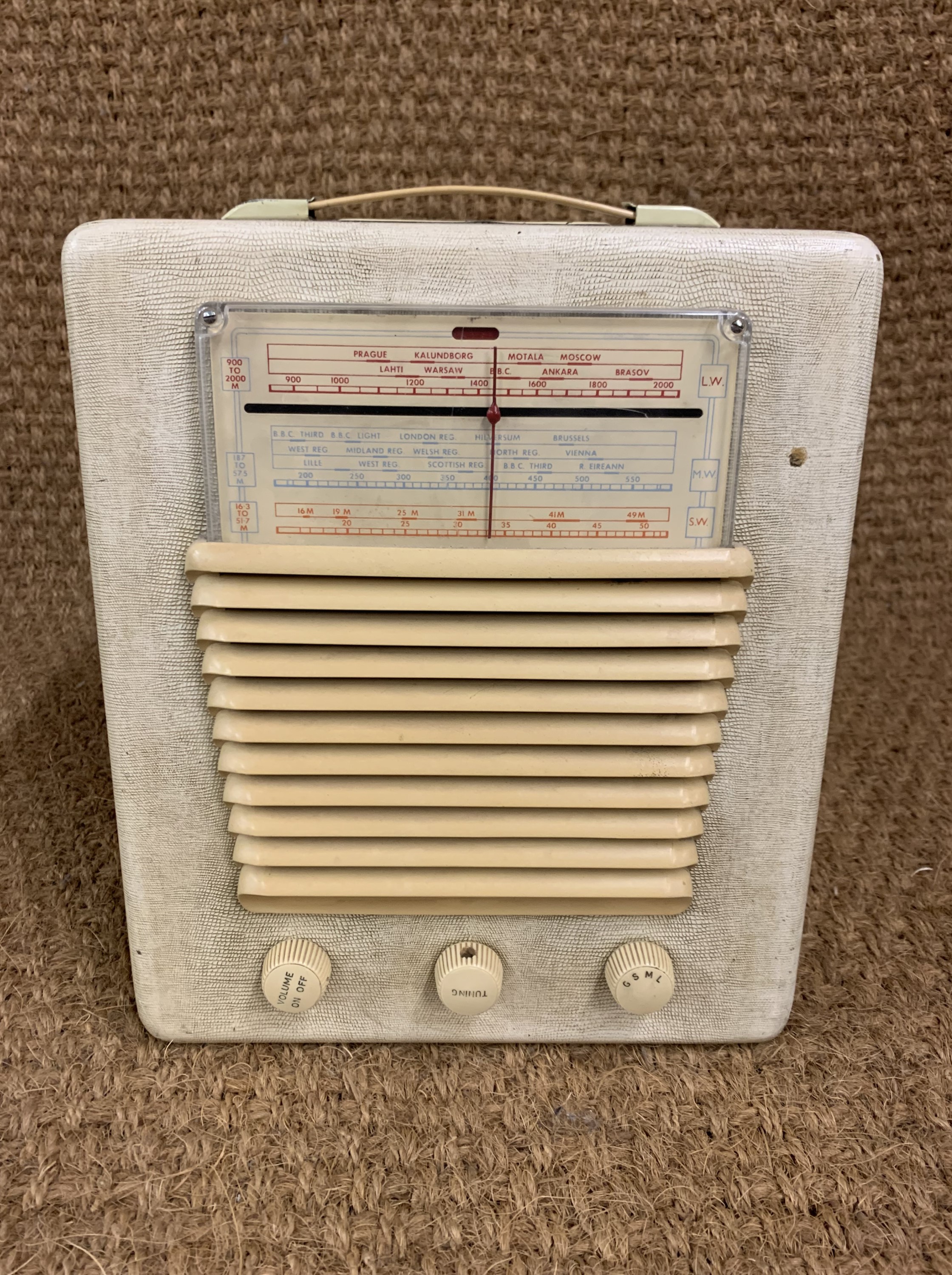 An HMV 1950s portable radio and turntable, model number 1507, AM radio with fold out turntable at