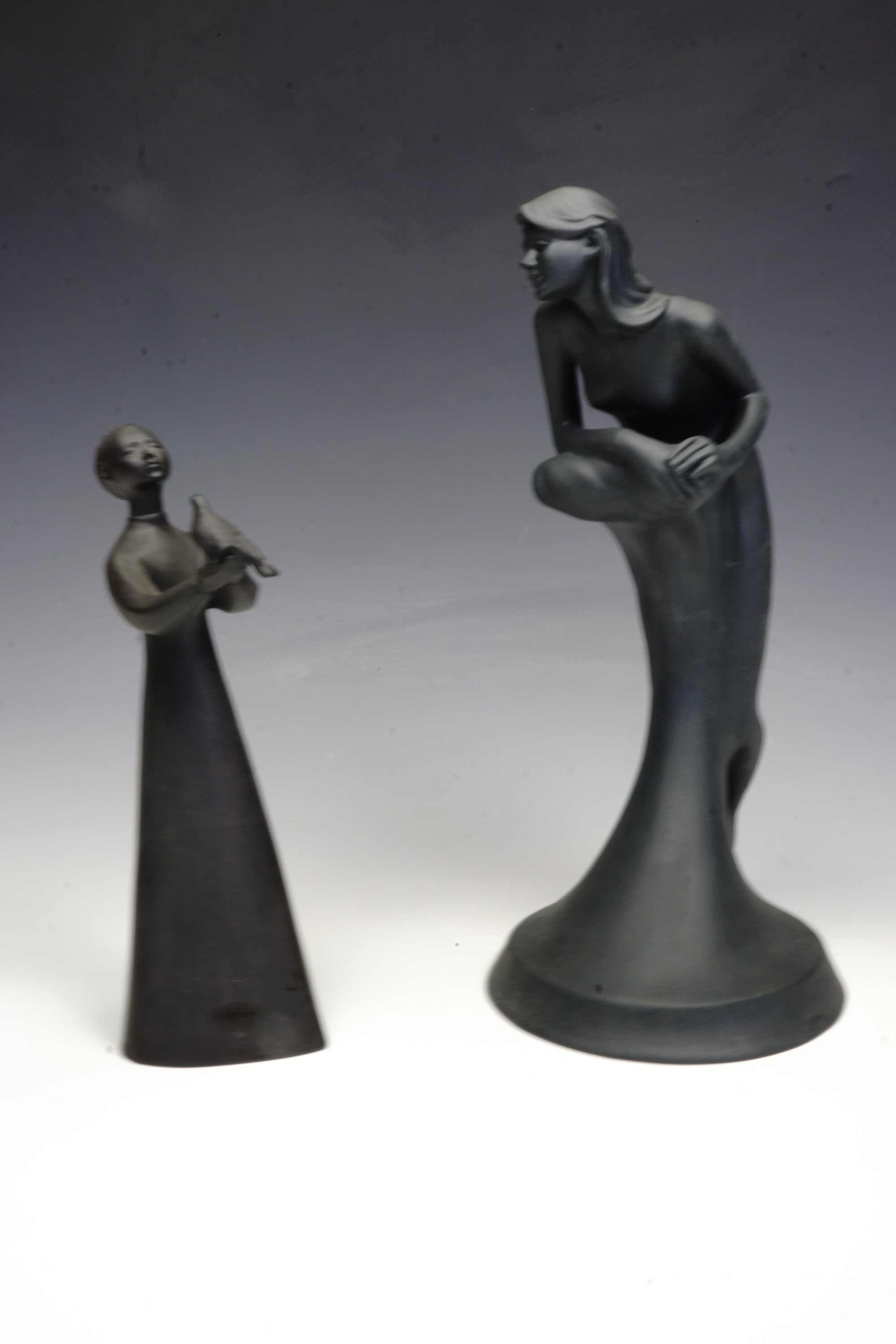 Two Royal Doulton figurines 'Free Spirit' and 'Peace', tallest 28 cm