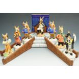 Royal Doulton 'Bunnykins' boxed 'Tudor Collection' display base, and seven unboxed Bunnykin