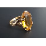 A faux citrine and 9 ct yellow cocktail ring, K, 3.2 g