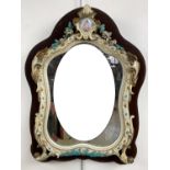 A Victorian flamboyant carved and painted wooden dressing table mirror, the frame embellished with