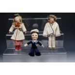 A Nora Wellings doll of a sailor together with two others similar, tallest 25 cm