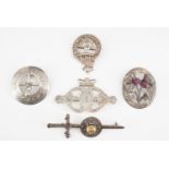 A group of predominantly Scottish silver and white metal jewellery including a Luckenbooth brooch