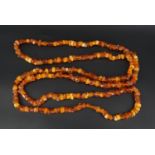 An amber bead necklace, 150 cm, 95 g