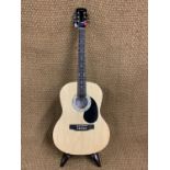 A Martin Smith acoustic guitar, case, stand etc