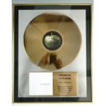 Two Beatles framed record discs 'The White Album' with 'The Beatles', largest 45 x 55 cm