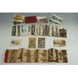 A quantity of Victorian and later postcards including a Great War silk, a very few military cards,