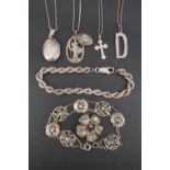 A group of white metal jewellery including a Maltese filigree bracelet, and Italian tope link
