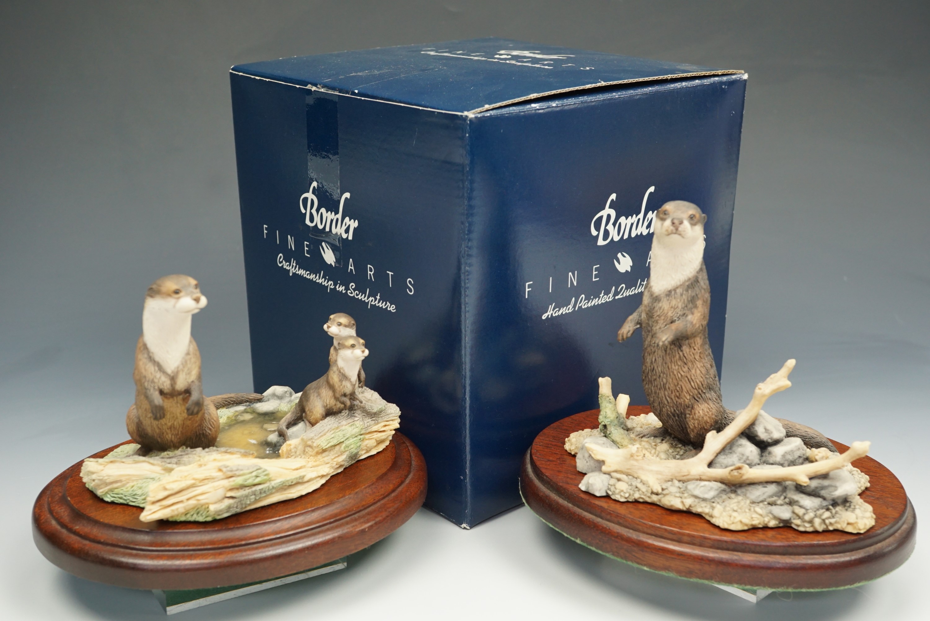 Two Border Fine Arts figurines 'RW2 Otter' and another similar with box, tallest 14 cm