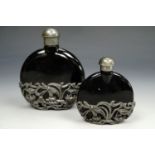 A pair of Art Nouveau influenced perfume bottles, tallest 9.5 cm