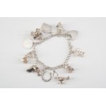 A silver charm bracelet, 37 g