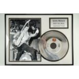 Two Elvis Presley framed record discs; 'Love Songs' and 'Don't Be Cruel', largest 41 x 52 cm